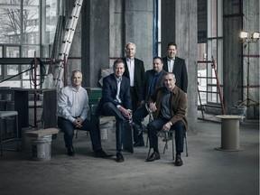 Domicile is owned by six  partners. Seated, left to right: Roch Chevrier, Rick Morris, Ron Zuccala and  David Chick. Standing: John Doran and Jose Dinis.