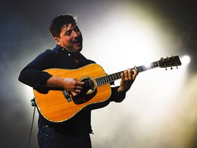 Marcus Mumford from Mumford and Sons performs at Canadian Tire Centre during the Wilder Mind tour on Sunday, June 12, 2016.