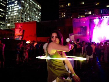 Melissa Goodman was hooping while the silent disco took place at Glowfair Festival Friday June 17, 2016.
