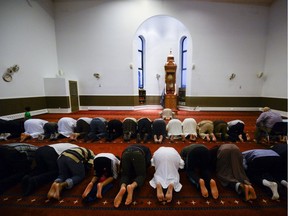 Members of Muslim community gathers at Ottawa Main Mosque to break fast and pray on the first day of Ramadan on Thursday, June 18, 2015.  (James Park / Ottawa Citizen)