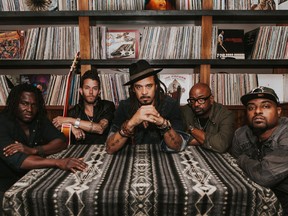 Michael Franti (centre) and Spearhead