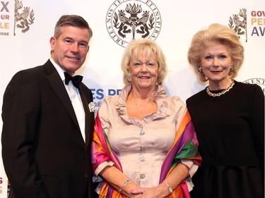 NAC Foundation board member Grant McDonald, regional managing partner with KPMG, with Vaughn Solomon Schofield, lieutenant-governor of Saskatchewan, and her sister, Adrian Burns, chair of the National Arts Centre board of trustees, at the NAC on Saturday, June 11, 2016, for the Governor General's Performing Arts Awards Gala.