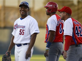 Ottawa Champions player Alexander Malleta and Cuban national team player Raul Gonzalez have a friendly chat before a game in 2016.
