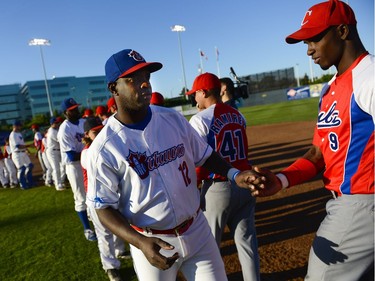 Ottawa Champions player Donal Duarte shakes hands with Cuban national team player Jefferson Delgado before the game.