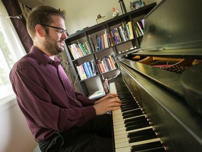 Ottawa jazz pianist Steve Boudreau in his home at his piano.