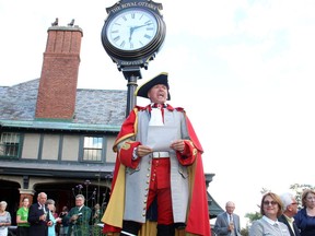 Ottawa town crier Daniel Richer grabs everyone's attention at a special 125th opening ceremony and cocktail reception held at the Royal Ottawa Golf Club in Gatineau, Quebec on Wednesday, June 29, 2016, to celebrate the golf club's 125th anniversary.