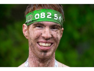 Patrick Reynolds is all smiles after completing the course as the Mud Hero Ottawa 2016 continued on Sunday at Commando Paintball located east of Ottawa.