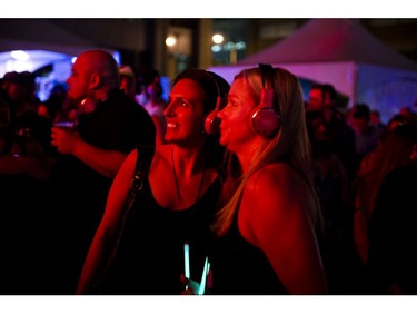 People danced the night away to the sound of battling DJ'S pumping tunes through headphones at the silent disco at Glowfair Festival Friday June 17, 2016.
