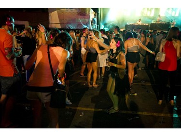 People danced the night away to the sound of battling DJ'S pumping tunes through headphones at the silent disco at Glowfair Festival Friday June 17, 2016.