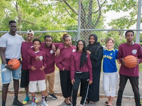 From left, are WEYM members Nyinyar Peter, Abdikarim Buraleh, Khalid Omar, Mukhtar Ismail, Wader Jemmie, Mishka Kana, Soumaya Farah, Adriana Sirskyj (mentor) and Abdullahi Omar. Not pictured: Nicholson Gabelus and Joshua Torres, mentors.