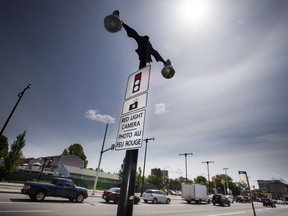 Revenue from red-light cameras should be spent on road safety programs, Mayor Jim Watson says.