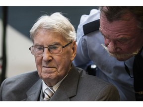 Reinhold Hanning enters the courtroom to face the verdict in Detmold, Germany on Friday June 17, 2016.