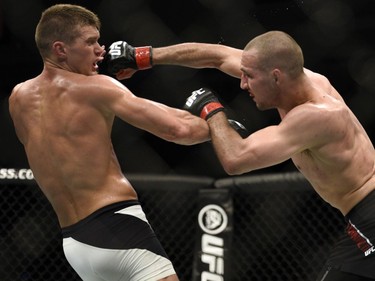 Rory MacDonald, right, fights Stephen Thompson in the welterweight main event during UFC Fight Night: MacDonald vs. Thompson at TD Place Arena Sunday June 19, 2016. (Darren Brown. Thompson won with a unanimous decision.