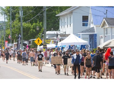 Rue Notre-Name was full of festival goers as the annual Amnesia Rockfest invades the village of Montebello in Quebec, about an hour away from Ottawa and Montreal.