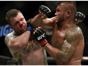 Sean O'Connell, left, battles Steve Bosse in a light heavyweight bout during UFC Fight Night: MacDonald vs. Thompson at TD Place Arena Sunday June 19, 2016.