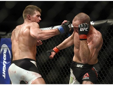 Stephen Thompson swigs at Rory MacDonald in the welterweight main event during UFC Fight Night: MacDonald vs. Thompson at TD Place Arena Sunday June 19, 2016. (Darren Brown. Thompson won with a unanimous decision.