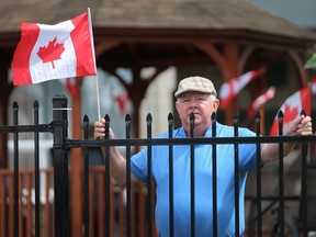 Henry McCambridge is upset that someone stole a number of Canadian flags that decorated the front of his seniors' building.