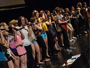 The Cappies Chorus rehearse a musical number, prior to the start of the 11th annual Cappies Gala awards, held at the National Arts Centre, on June 05, 2016, in Ottawa, Ont.  (Jana Chytilova / Ottawa Citizen)   ORG XMIT: 0605 CapGala JC 01