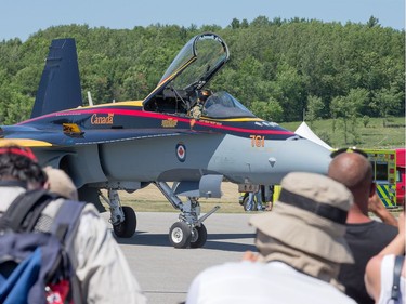 The CF 18 taxis on the runway as Vintage Wings of Canada put on their annual Wings Over Gatineau Airshow at the Gatineau Airport.