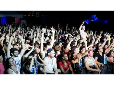 The crowd danced as the Dj's performed at Glowfair Festival Friday June 17, 2016.