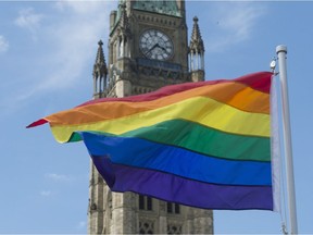 The pride flag flies following a raising ceremony on Parliament Hill Wednesday June 1.