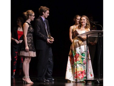 The winner(s) for Ensemble in a Play: Standish Family, Jacob Crocker (M), Riley Murphy (R), and Samra Brkic (L), A.Y. Jackson Secondary School for The Dining Room, accept(s) their award, during the 11th annual Cappies Gala awards, held at the National Arts Centre, on June 05, 2016.