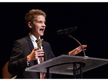 The winner(s) for Lead Actor in a Musical: Robbie Zwierzchowski, Woodroffe High School for How to Succeed in Business Without Really Trying, accept(s) their award, during the 11th annual Cappies Gala awards, held at the National Arts Centre, on June 5, 2016.