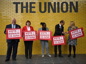 Labour council leaders hold banners in favour of remaining in the EU at a 'Labour IN' event, promoting the case to remain in the EU, at the University in Manchester. Two new polls have indicated that British voters are favouring a 'Brexit,' one week ahead of the June 23 referendum.
