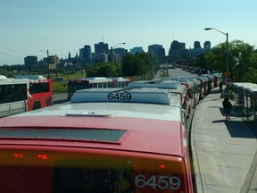 Buses lined up on Slater Street Friday, June 24.
