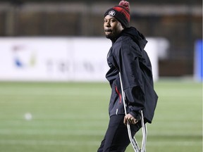 William Powell of the Ottawa Redblacks in crutches against the Winnipeg Blue Bombers at TD Place in Ottawa, June 13, 2016