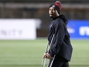 William Powell of the Ottawa Redblacks on crutches during the pre-season match against Winnipeg Blue Bombers at TD Place in Ottawa, June 13, 2016.