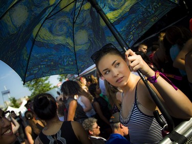 17 year old Sophie Chin under her parasol at the City Stage.