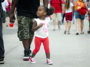 Two-year-old Lindsay Kazapua Vielot in downtown Ottawa on Canada Day, Friday, July 1, 2016.