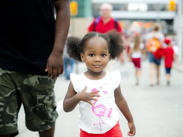 Two-year-old Lindsay Kazapua Vielot in  downtown Ottawa on Canada Day, Friday, July 1, 2016.