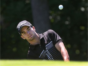 Etienne Papineau chips the ball during the Alexandre of Tunis at the Ottawa Hunt & Golf Club in Ottawa Sunday July 3, 2016.