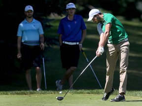 Joey Savoie drives the ball during the Alexandre of Tunis at the Ottawa Hunt and Golf Club in Ottawa on Sunday, July 3, 2016. Chris McCuaig, the Ottawa Hunt and Golf Club member who won the Tunis at his home course in 2007, said added length on the golf course itself partly explains the rising cut line.