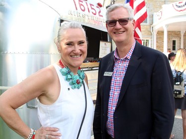 Ann Rickenbacker, director of catering at The Westin Ottawa, with the hotel's general manager, Ross Meredith, at the U.S. Embassy's road trip-themed 4th of July party, catered by The Westin, on Monday, July 4, 2016, at Lornado, the official residence of the U.S. ambassador and his wife.