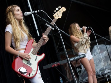 Bahari bassist Natalia Panzarella, keyboardist Ruby Carr and guitarist Sidney Sartini performing on the Claridge Stage at Ottawa Bluesfest on Sunday July 10, 2016.