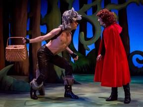 The Big Bad Wolf (played by Eric Morin) meets Little Red Riding Hood (Nicole Norsworthy) in the woods.