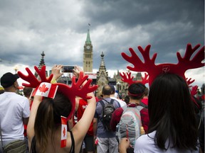 Enthusiastic crowds came to Parliament Hill on Canada Day. (Photo by Ashley Fraser)