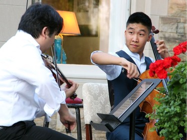 Cellist Bryan Cheng performed with National Arts Centre Orchestra concertmaster Yosuke Kawasaki at an outdoor concert held at the Italian ambassador's residence on Tuesday, July 5, 2016, as part of a fundraiser for the Friends of the NAC Orchestra.