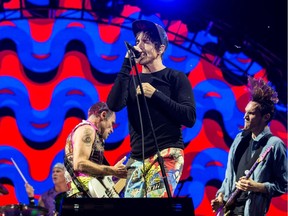 Chad Smith,Flea, Anthony Kiedis, and Josh Klinghoffer of the Red Hot Chili Peppers performing at Ottawa Bluesfest on Friday July 15, 2016.