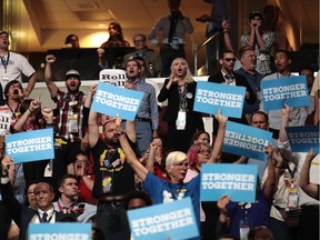 PHILADELPHIA, PA - JULY 27:  Delegates and attendees cheer during the opening of the third day of the Democratic National Convention at the Wells Fargo Center, July 27, 2016 in Philadelphia, Pennsylvania. Democratic presidential candidate Hillary Clinton received the number of votes needed to secure the party's nomination. An estimated 50,000 people are expected in Philadelphia, including hundreds of protesters and members of the media. The four-day Democratic National Convention kicked off July 25.