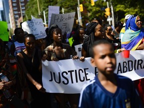 Demonstrators march from Somerset Square Park to Ottawa police headquarters on Elgin Street during the 'March for Justice' for Abdirahman Abdi last July, shortly after his death.