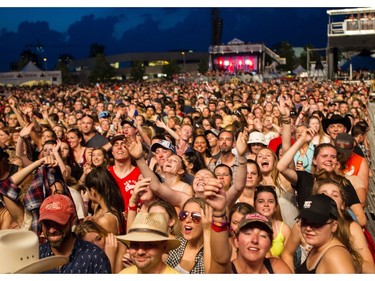 Fans enjoy Brad Paisley performing on the City Stage at Ottawa Bluesfest on Wednesday July 13, 2016.