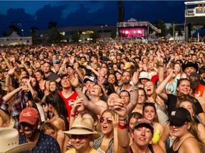 Fans enjoy Brad Paisley performing on the City Stage at Ottawa Bluesfest on Wednesday July 13, 2016.
