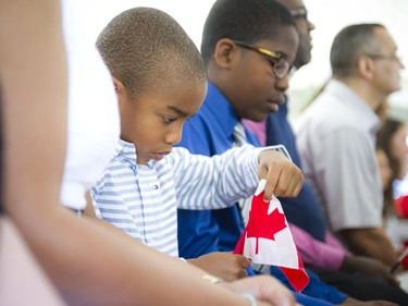 Four-year-old Mathis Michel at the Canadian Citizenship ceremony held on Canada Day at the Bytown Museum in Ottawa, Friday, July 1, 2016.