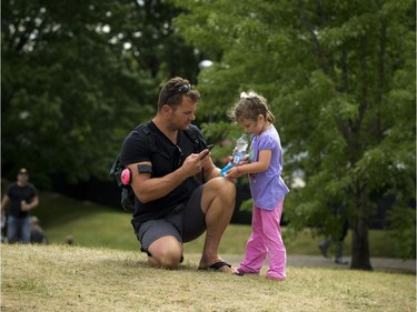 Four year old Tye LaBranche and her dad Marc LaBranche at Bluesfest Sunday July 10, 2016.