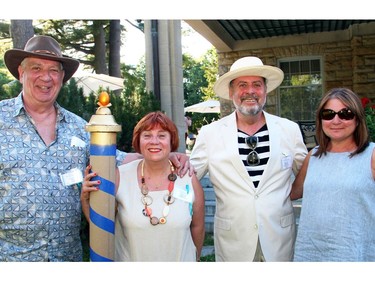 From left, Bill Pugsley with fellow organizing committee members Melina Vacca-Pugsley, Gerard Lavelle and Kym Ashton at the Venice-themed garden party and concert hosted by the Italian ambassador at his official residence in Gatineau on Tuesday, July 5, 2016, in support of Friends of the National Arts Centre Orchestra.