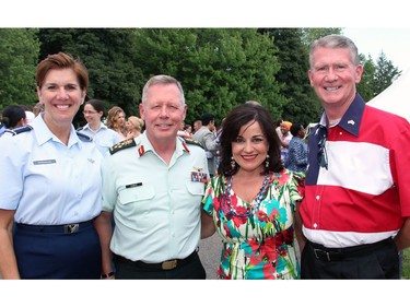 From left, General Lori Robinson, the highest ranking woman in U.S. military history, with Canadian General Jonathan Vance, chief of defence staff, and his wife, Kerry Vance, and retired U.S. Air Force major general David Robinson at the 4th of July party hosted by the U.S. Embassy on Monday, July 4, 2016, at the U.S. ambassador's official residence, Lornado, in Rockcliffe Park.